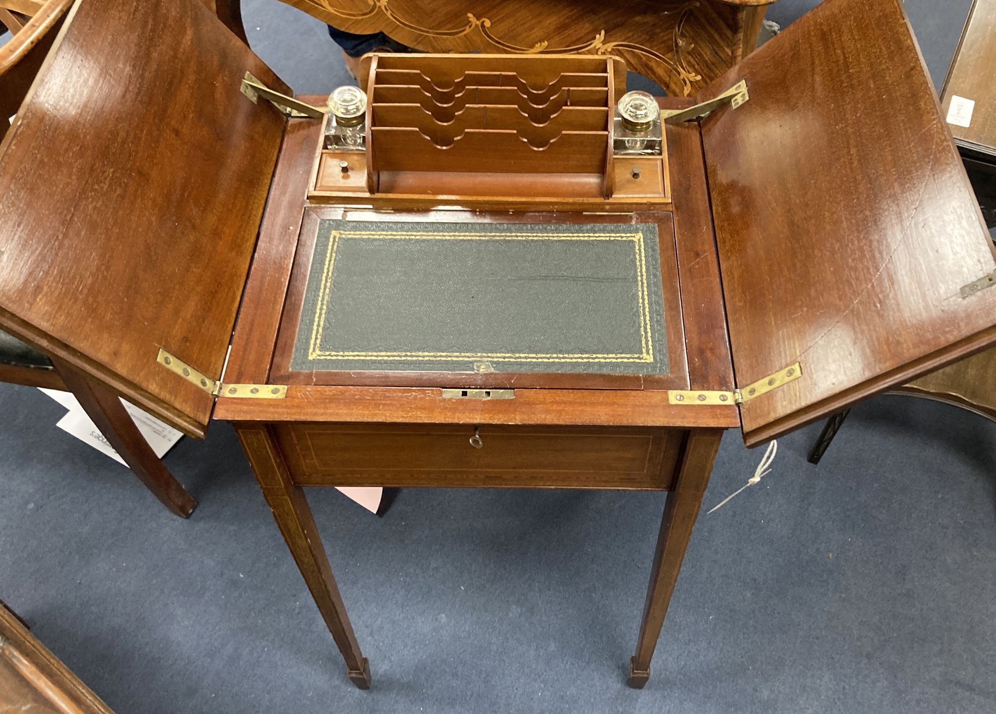 An Edwardian inlaid mahogany surprise writing table, width 48cm depth 49cm height 73cm